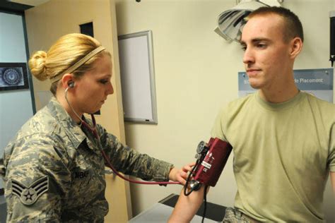 A person in a military uniform with a stethoscope