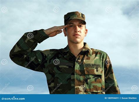 Army Soldiers Standing at Attention During Reveille