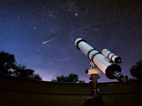 Astronomers using a telescope