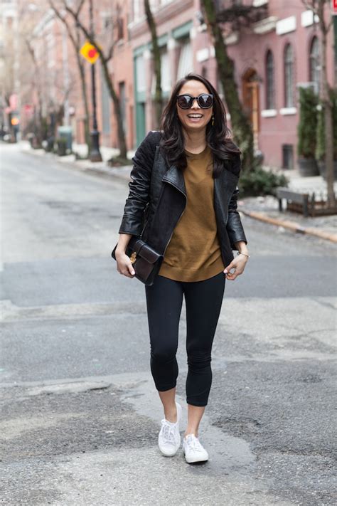 Navy blue tee with athletic pants and sneakers