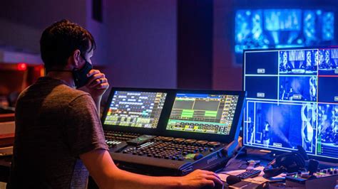 Audio Visual Technician Installing Equipment