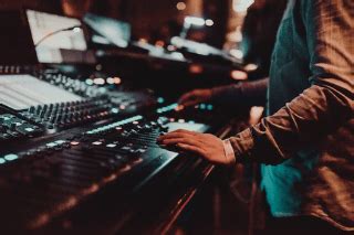 Audio Visual Technician Setting Up Equipment