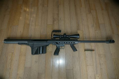 Barrett 50 cal rifle with optic