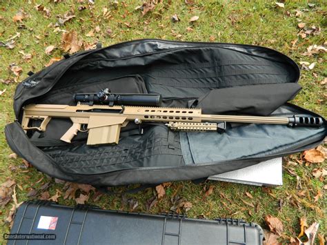 Barrett 50 cal rifle with tactical rail