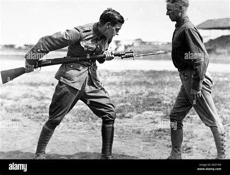 Soldiers engaging in bayonet fighting