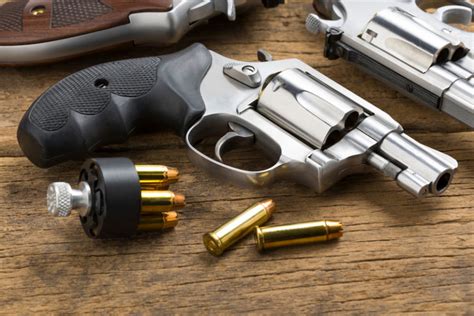 When choosing a revolver as a beginner, consider factors such as caliber, size, weight, and price