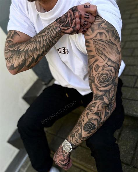 Black and gray sleeve tattoo design