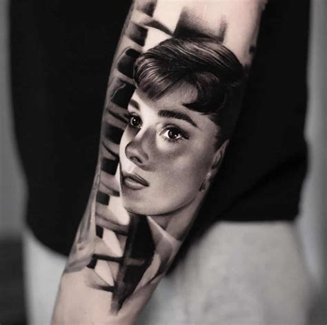 Black and gray leg sleeve tattoo