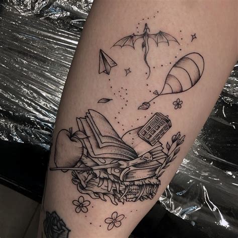 Book tattoos on arm