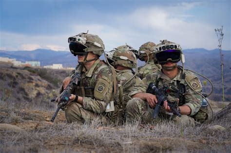 Troops working on laptops