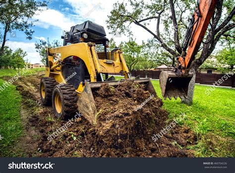 Bulldozer Moving Earth