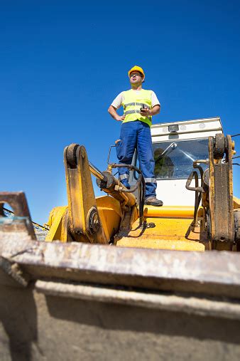 Bulldozer operator clearing land