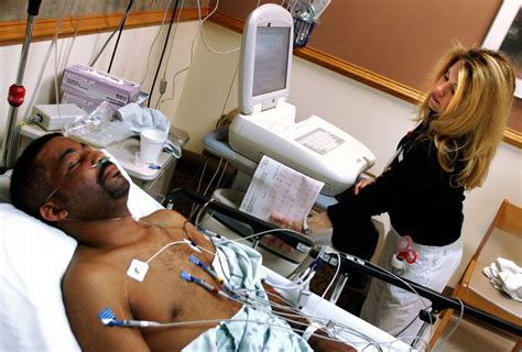 A cardiac technician conducting a test