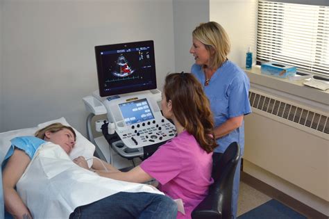 A cardiac technician with a patient