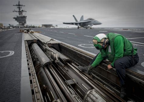 Catapult Maintenance on Aircraft Carrier