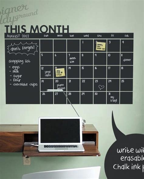 A chalkboard calendar in a bedroom