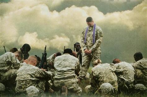 Chaplain Praying with Soldiers