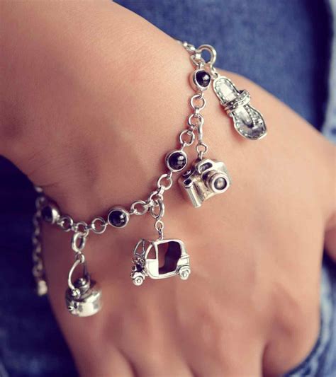 Charm bracelet with travel-themed charms