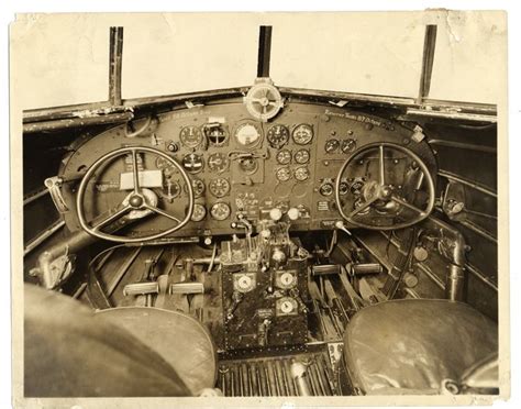 A vintage illustration of an early aircraft cockpit