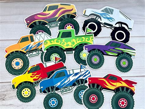 A collection of monster truck toys and calendars