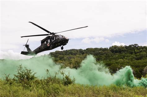 Combat medic helicopter landing in a war zone