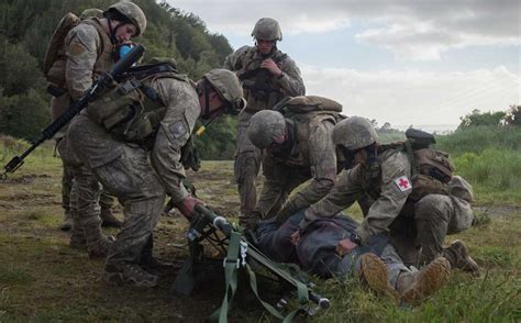 Combat Medics Maintaining Equipment