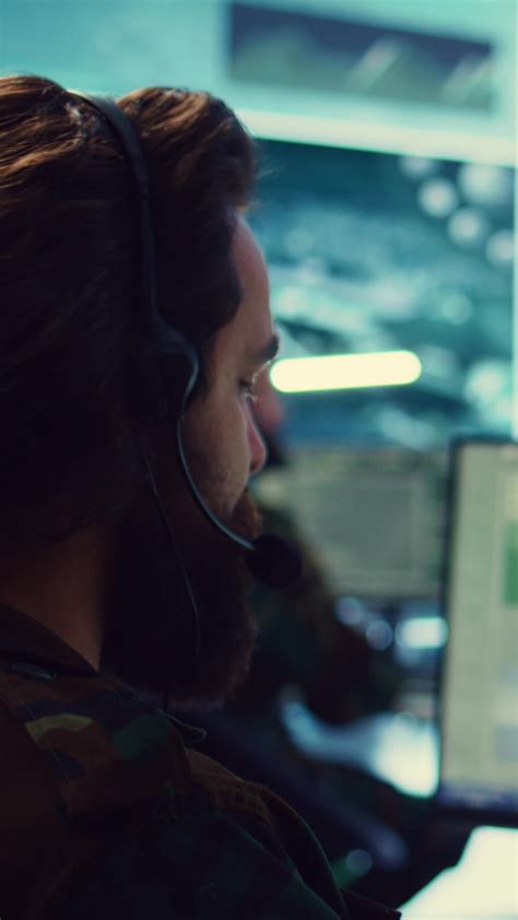 A commander coordinating with allies, with a map or chart in the background