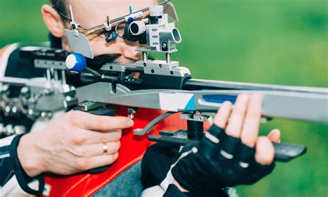 A competitor in action during a competitive shooting event