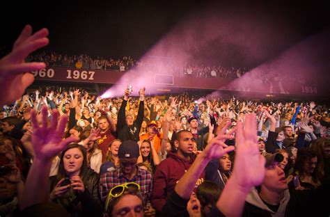 A crowd of people enjoying a live concert