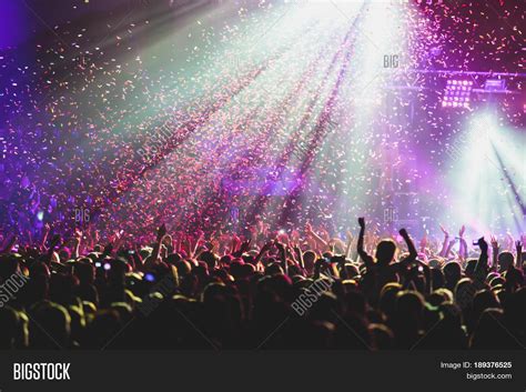 A crowd of people enjoying a live concert