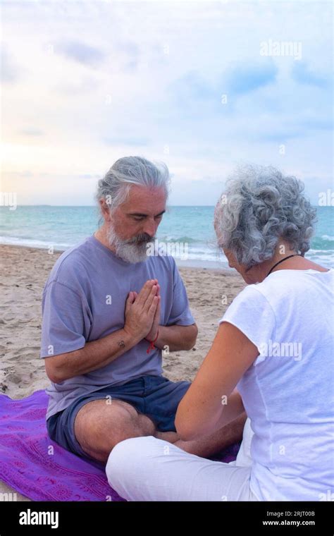 Couple meditating together