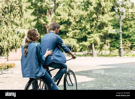 Couple riding bicycles together