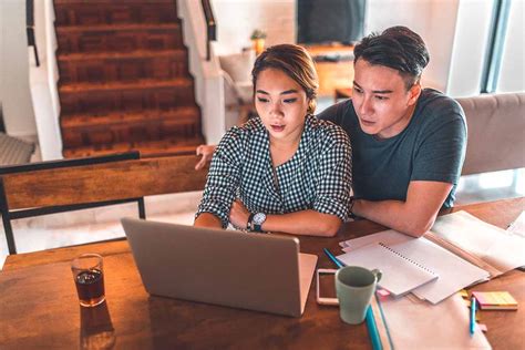 A couple reviewing their finances and budget together