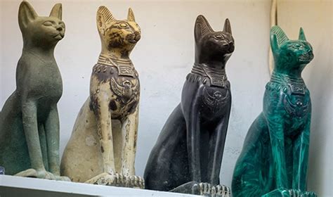 Ancient Egyptian cat artifact under the light of the moon