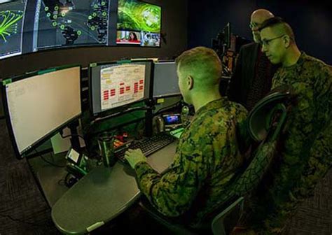 Cyber Operations Specialist working on a computer