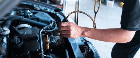 A mechanic diagnosing a car problem