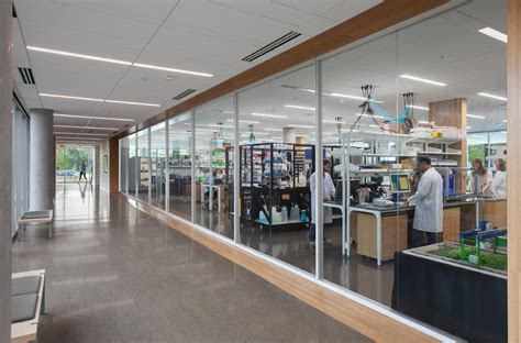 Photographer capturing a science experiment at a research center