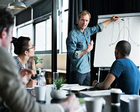 Engineer leading a meeting