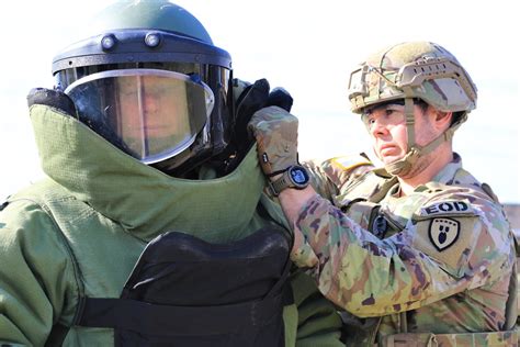 EOD officer analyzing explosive device