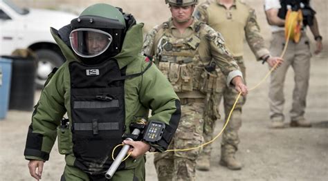 EOD technicians working in hazardous conditions