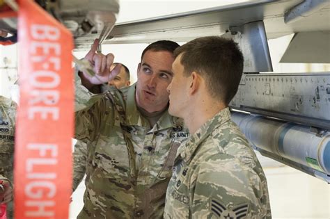 EOD technicians working together