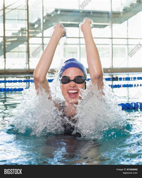 Excited swimmers at a competition