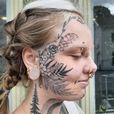 Female face tattoo album