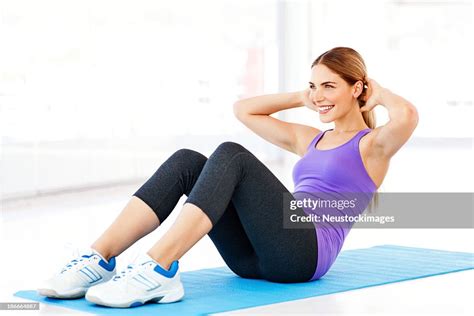 Female soldier doing sit-ups