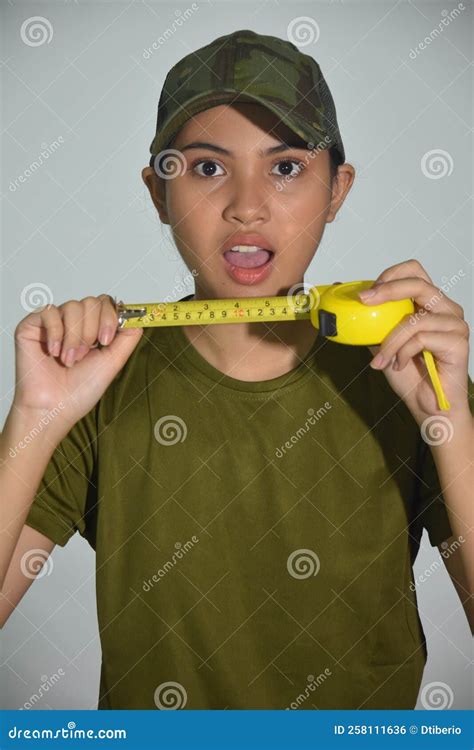 Female soldier measuring body fat