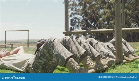 Female soldier doing sit-ups