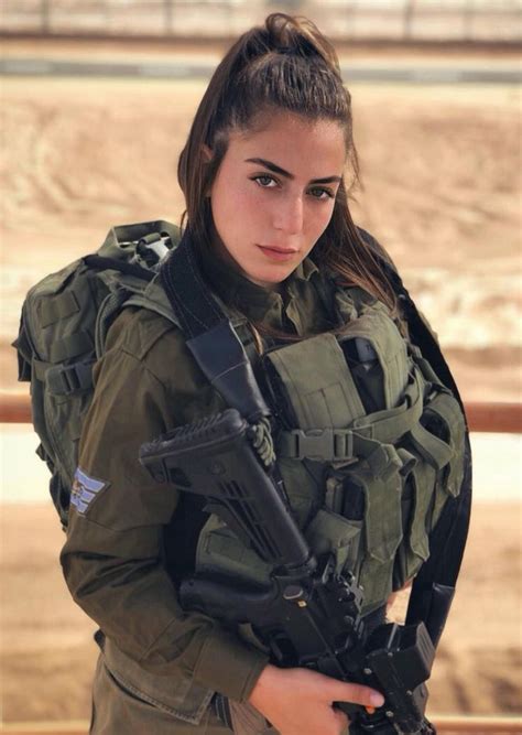 Female soldiers receiving awards