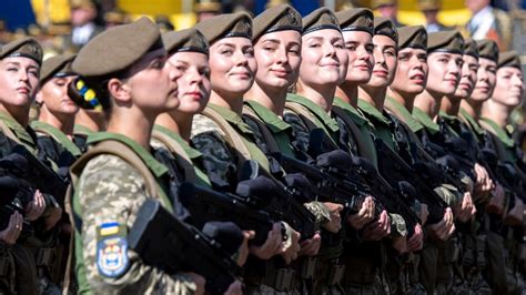 Female soldiers showing camaraderie