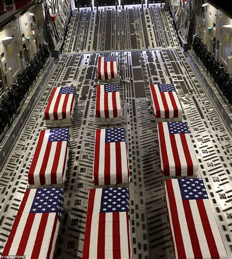 Flag-draped coffins of fallen soldiers