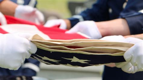 Flag folding ceremony at a military funeral